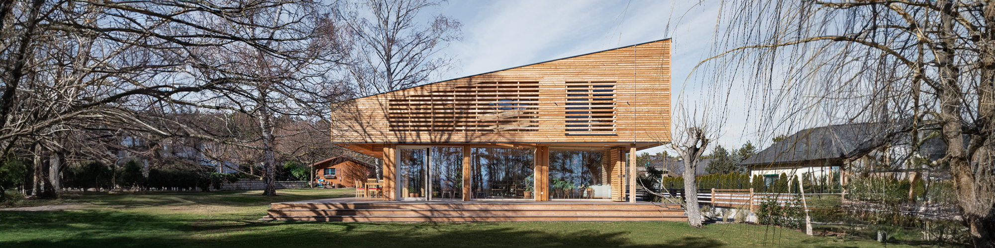 Holz100 Architektenhaus - Moderne Eleganz im Einklang mit der Natur - Thoma Holz100