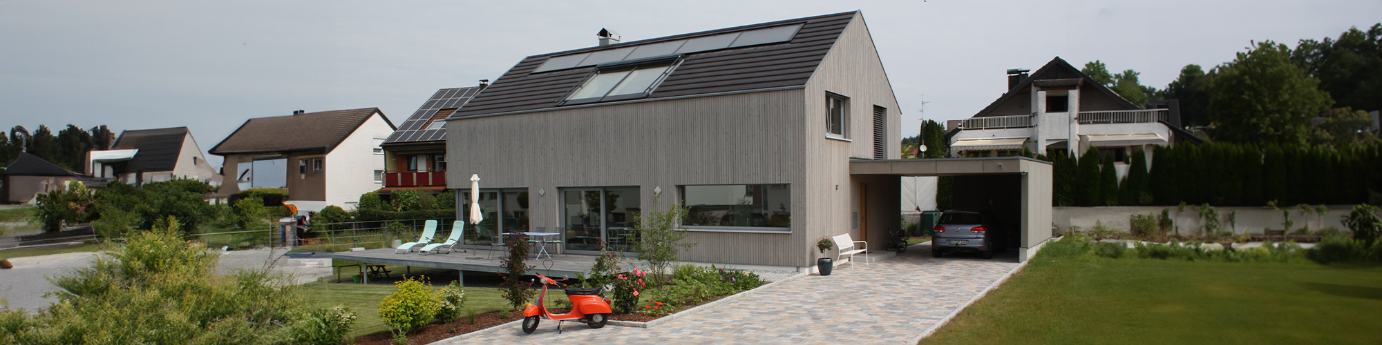 Holz100 Einfamilienhaus mit Einliegerwohnung & Carport - Thoma Holz100