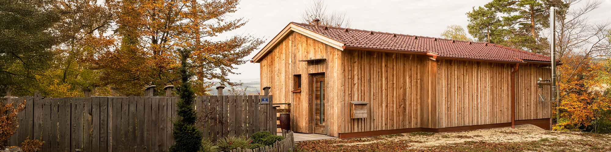 Massivholzhaus im Lärchenkleid - Thoma Holz100